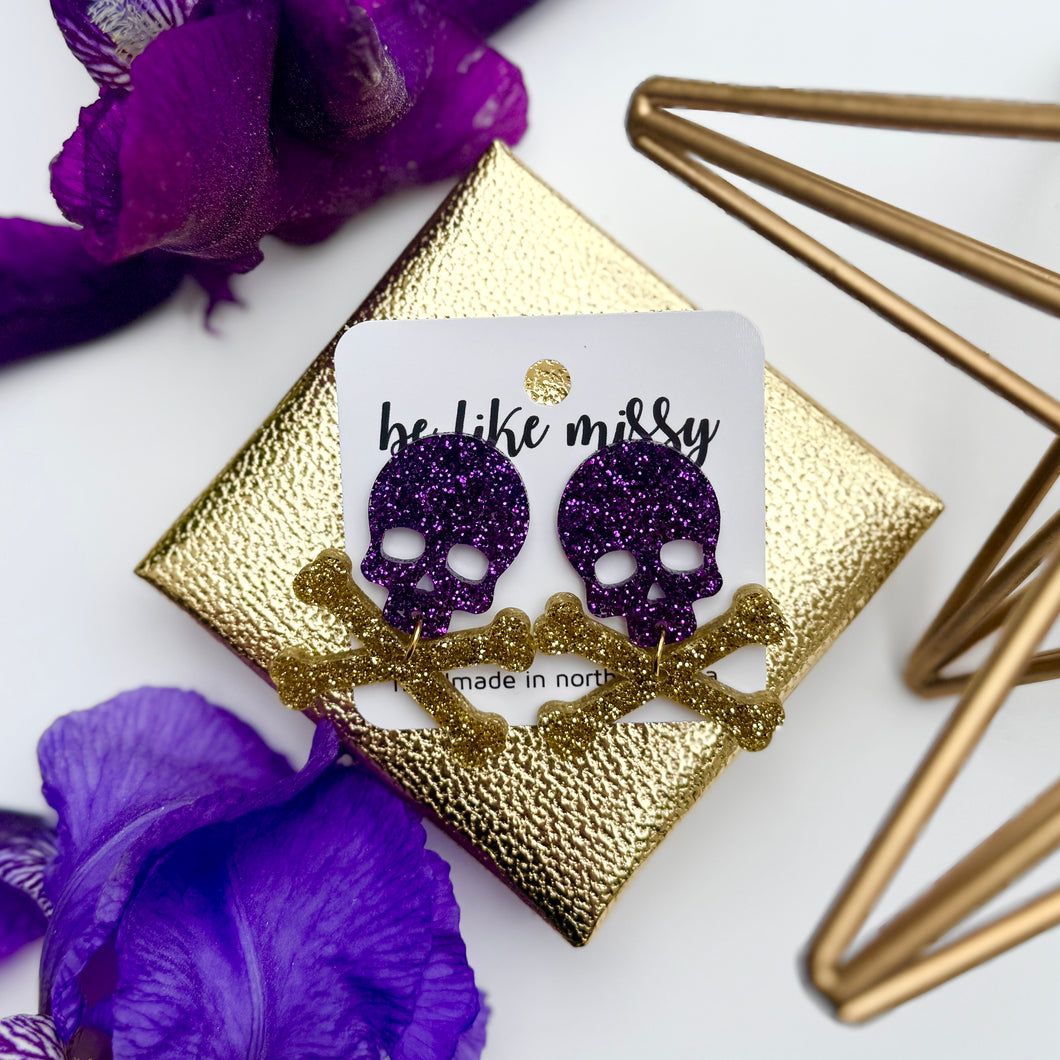 Gold and Purple Skull and Crossbones Acrylic Earrings