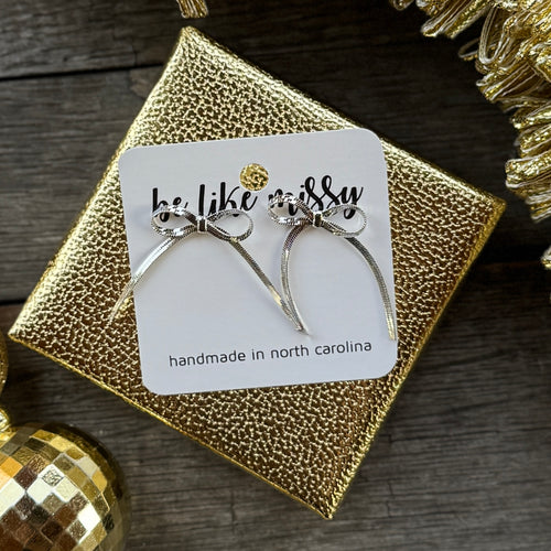 Bow Statement Studs - White Gold - Silver