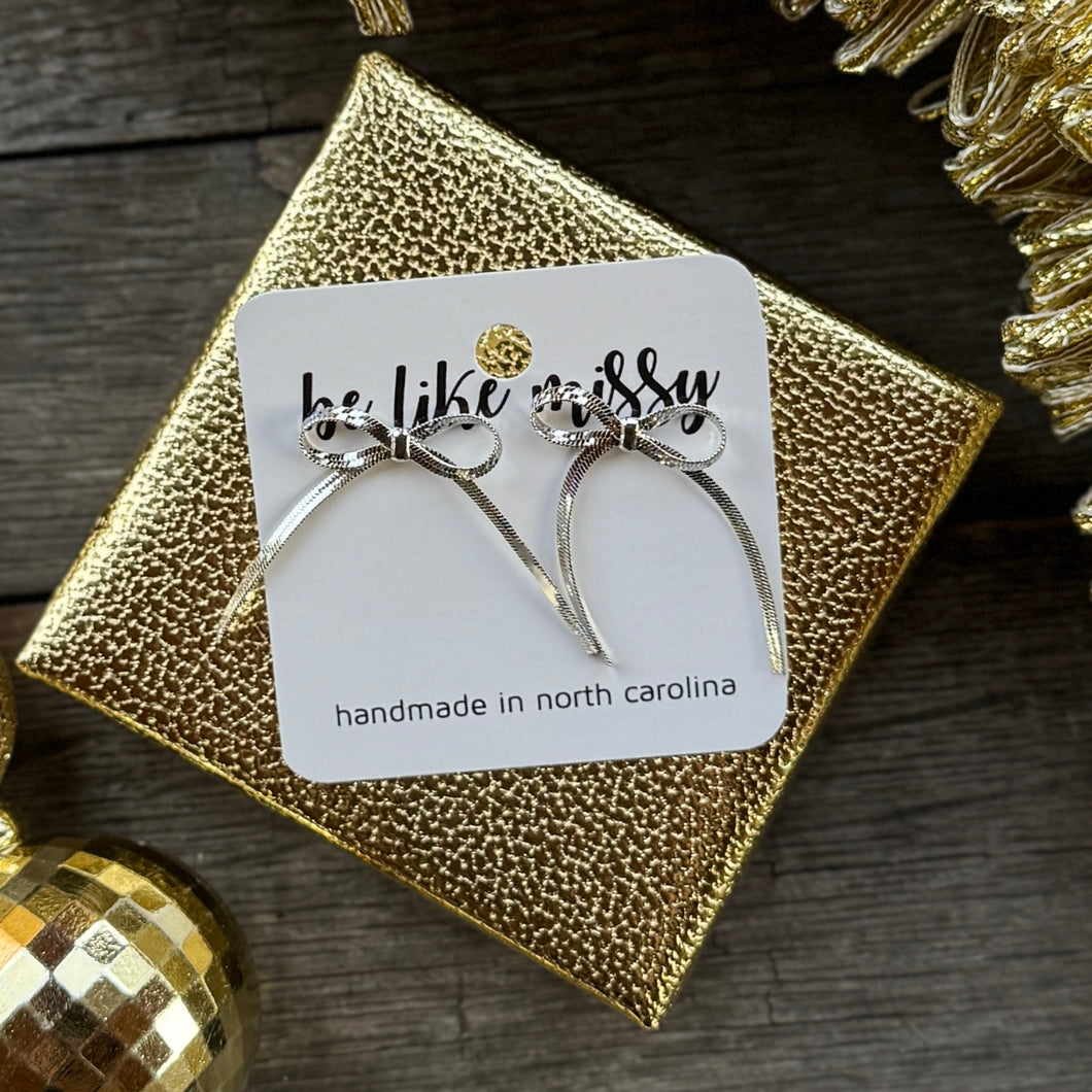 Bow Statement Studs - White Gold - Silver